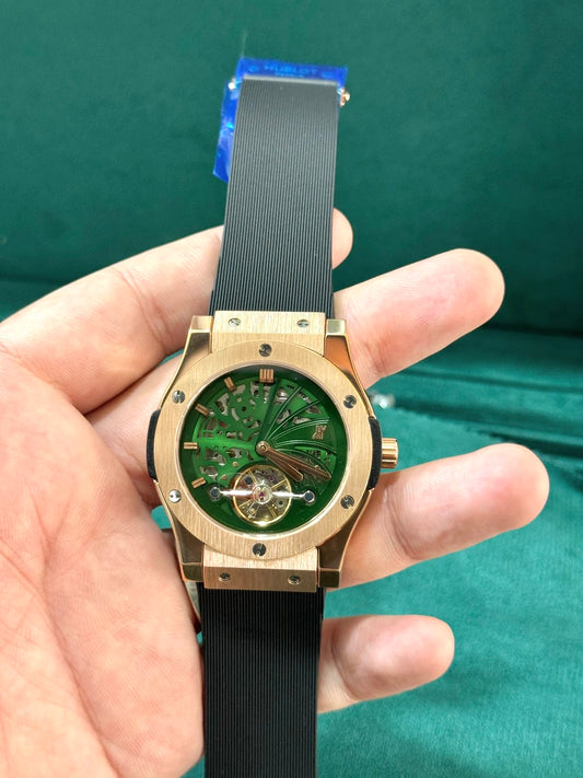 Automatic Hublot With Green Dail.